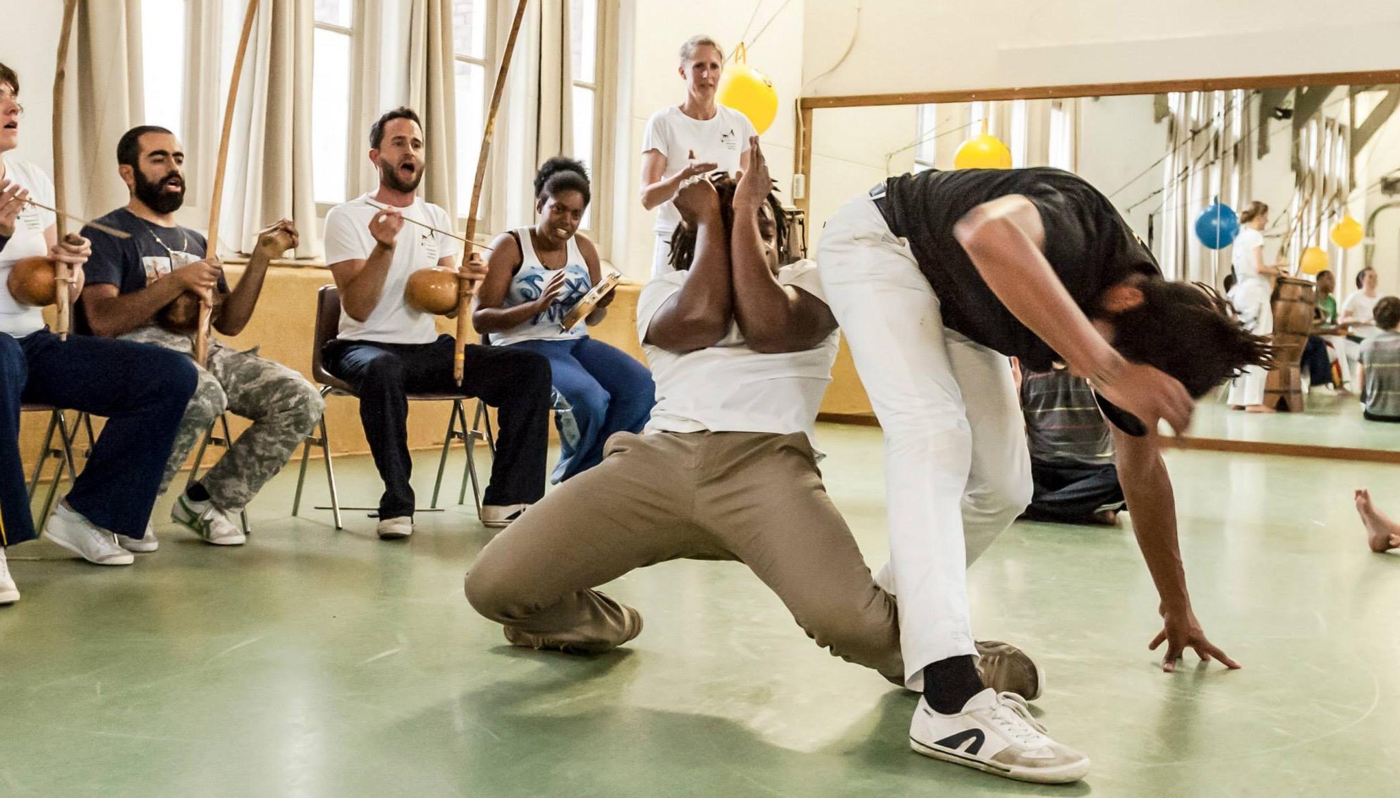 A game at the Capoeira Festival Connect & Play, the bateria playing behind